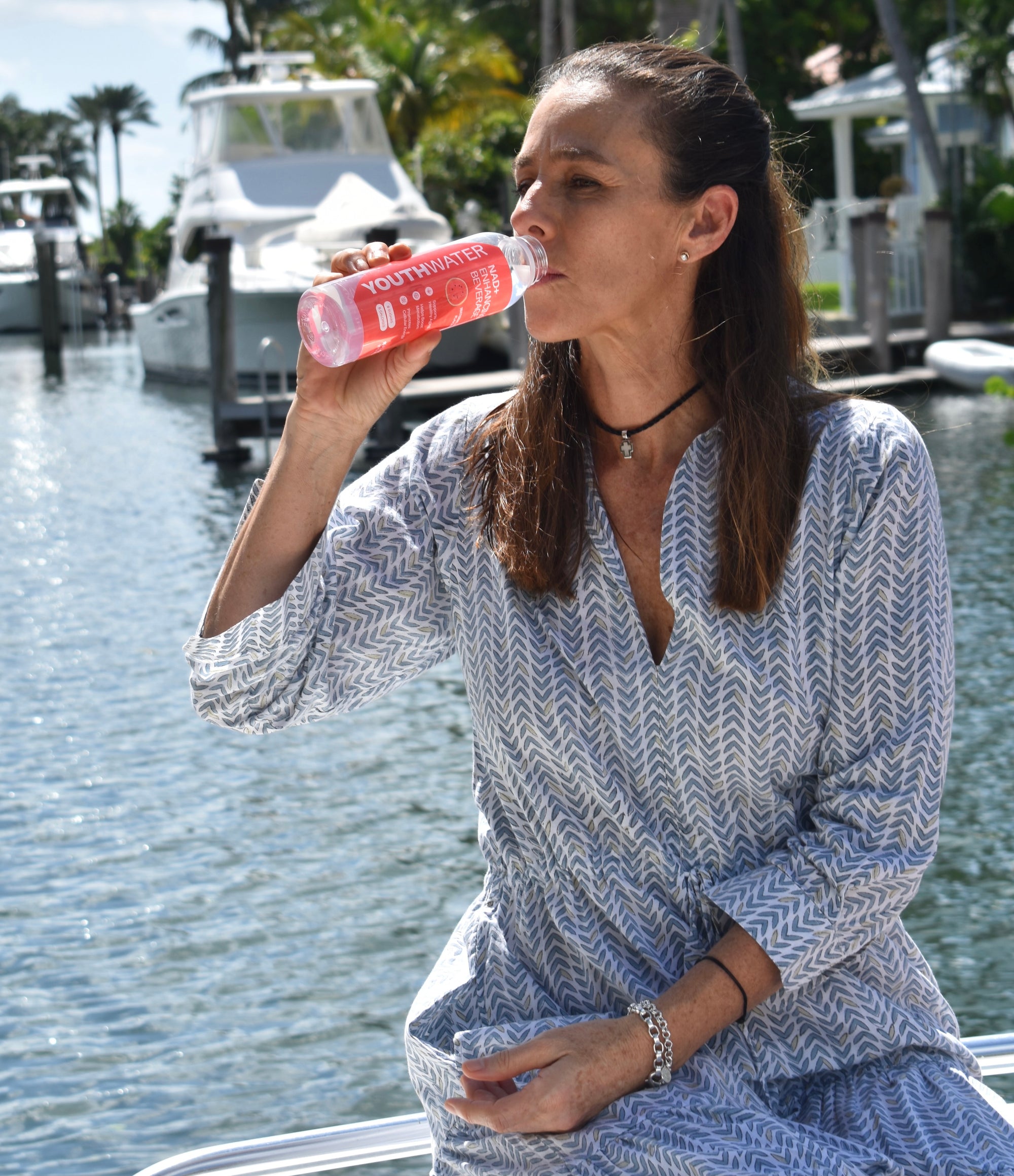 Drinking YOUTHWATER NAD+ Enhancing Beverage